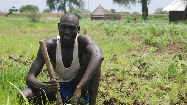A farmer planting on his land in Ethiopia