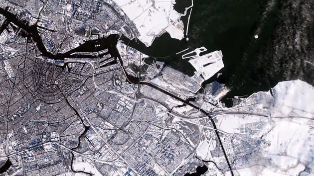Satellite image of Amsterdam, Netherlands covered in snow
